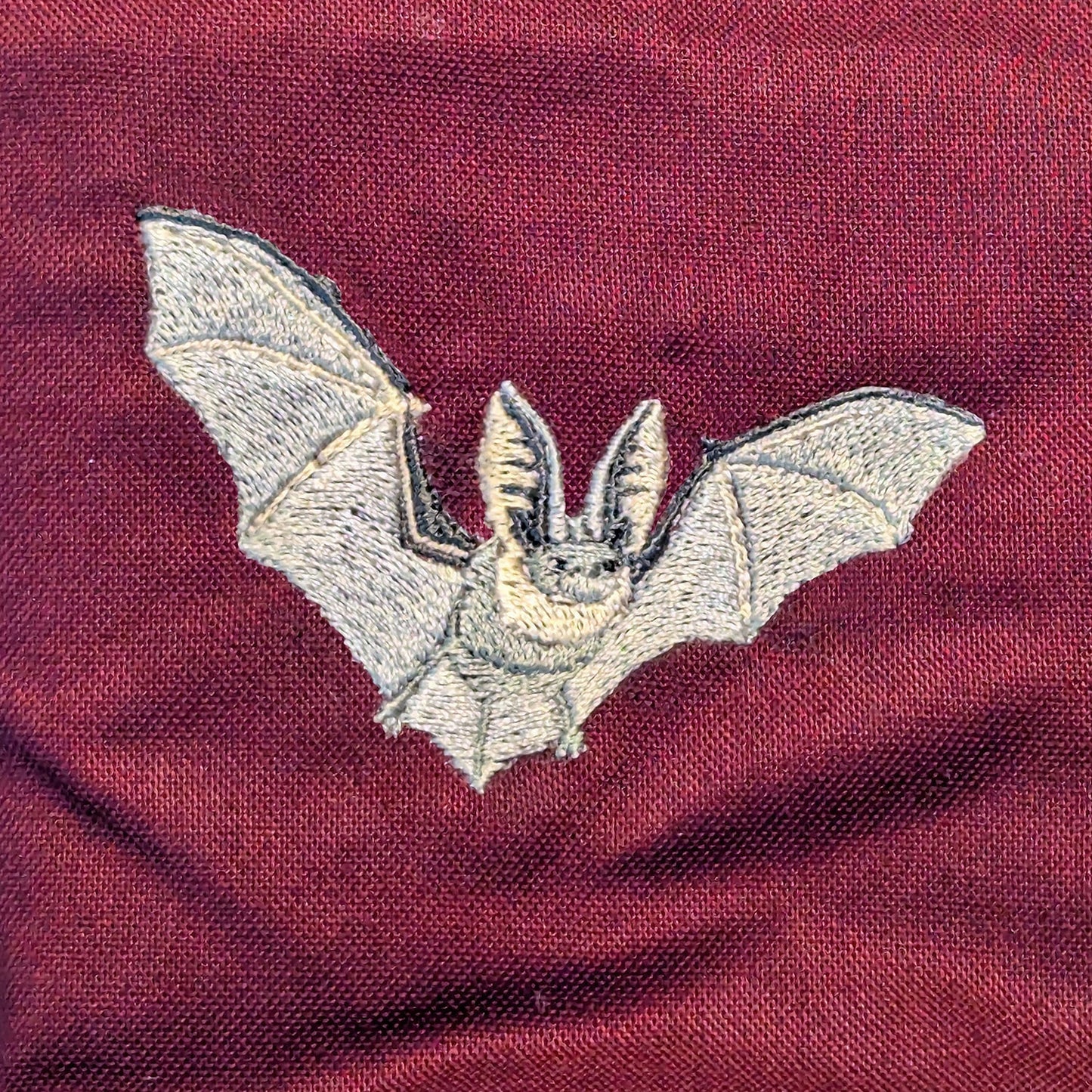 Closeup photo of the Grey Long-Eared Bat embroidery design