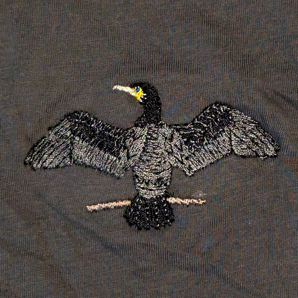 Closeup photo of the Cormorant embroidery design