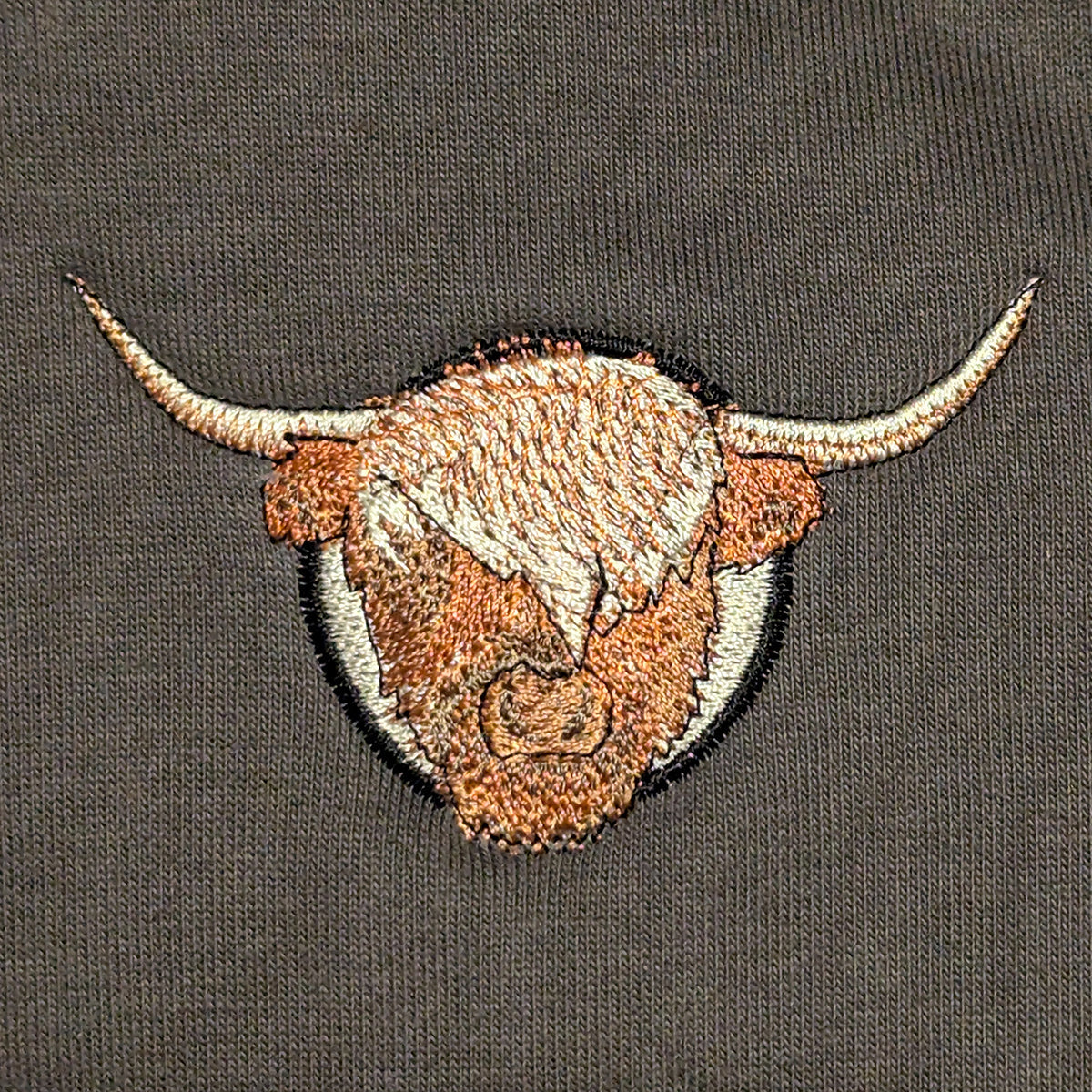 Closeup photo of the Highland Cow embroidery design