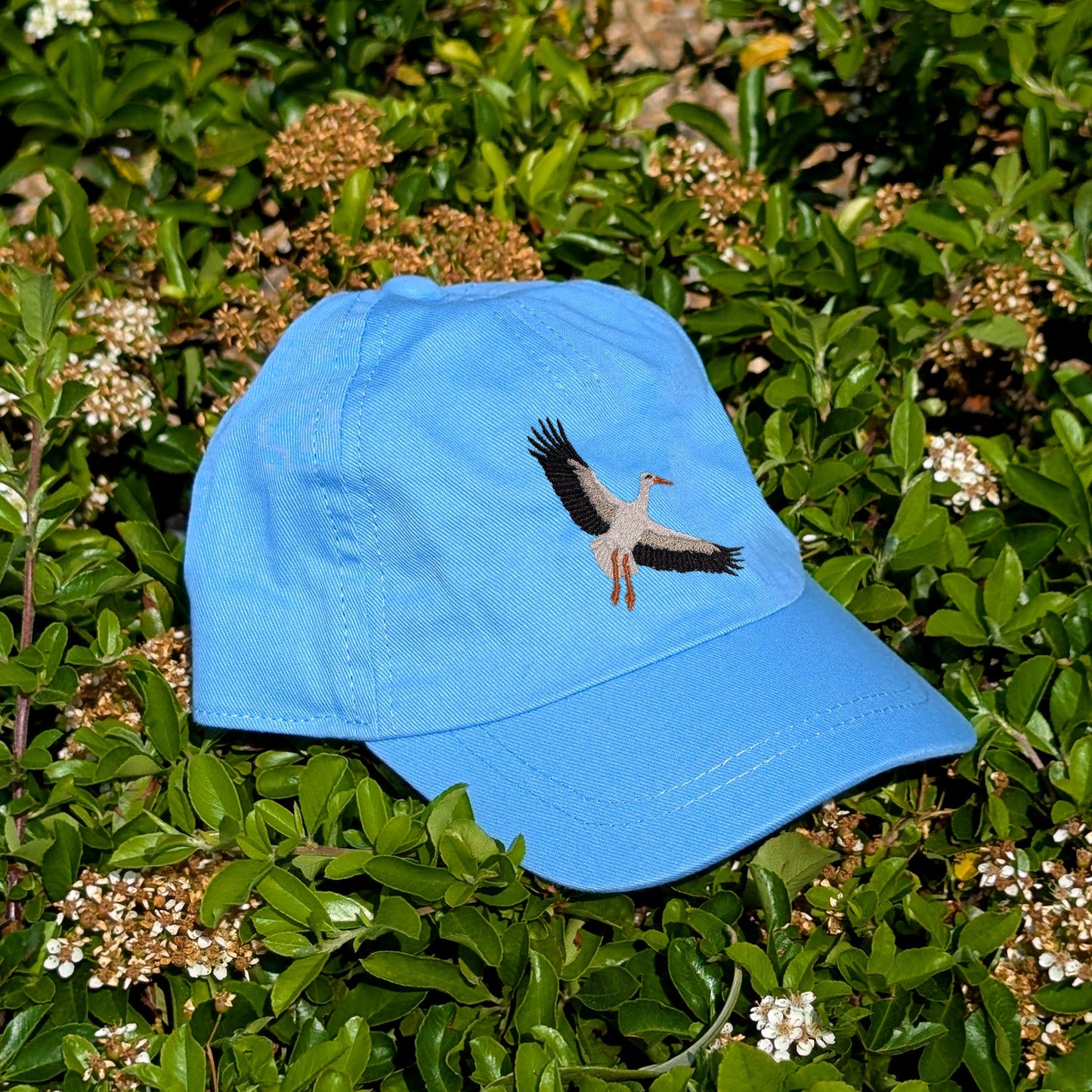 White Stork Flight Embroidered Baby/Toddler Cap (up to 5 years)