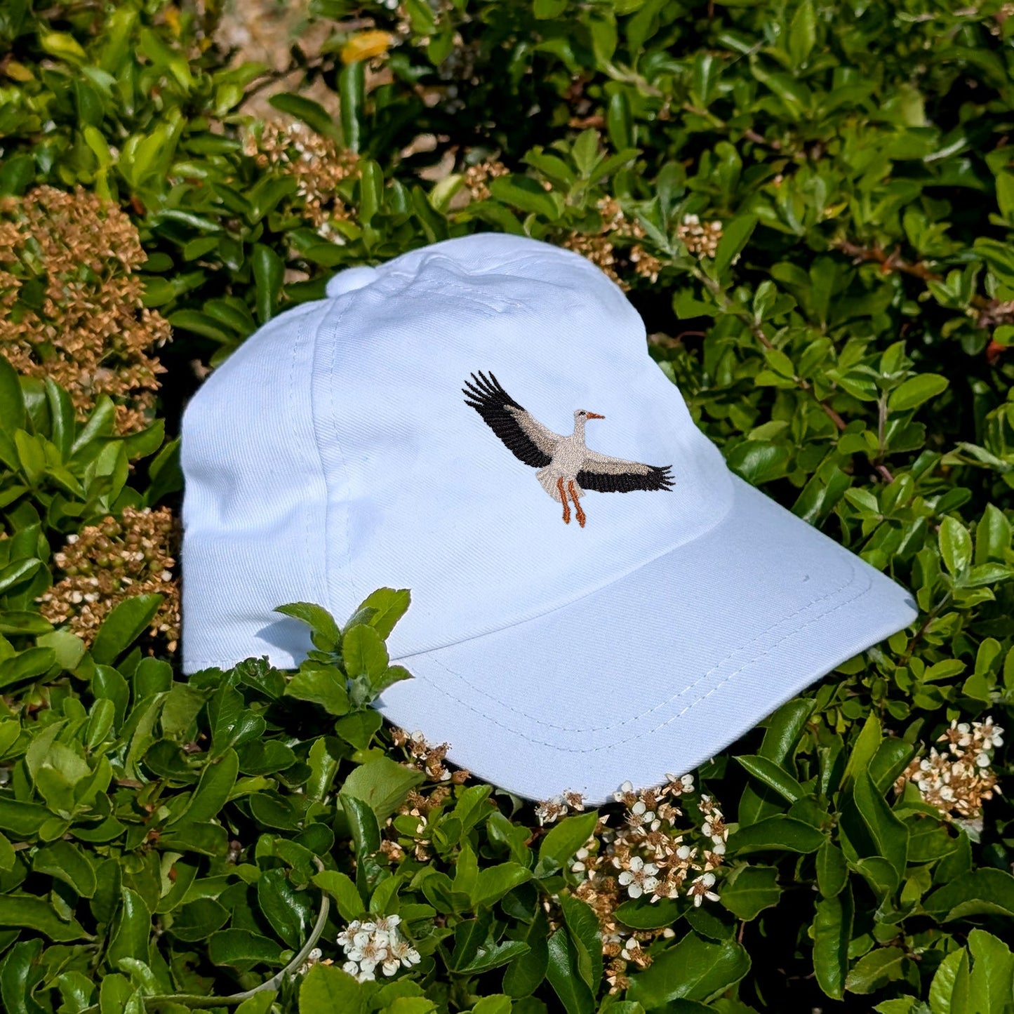 White Stork Flight Embroidered Baby/Toddler Cap (up to 5 years)
