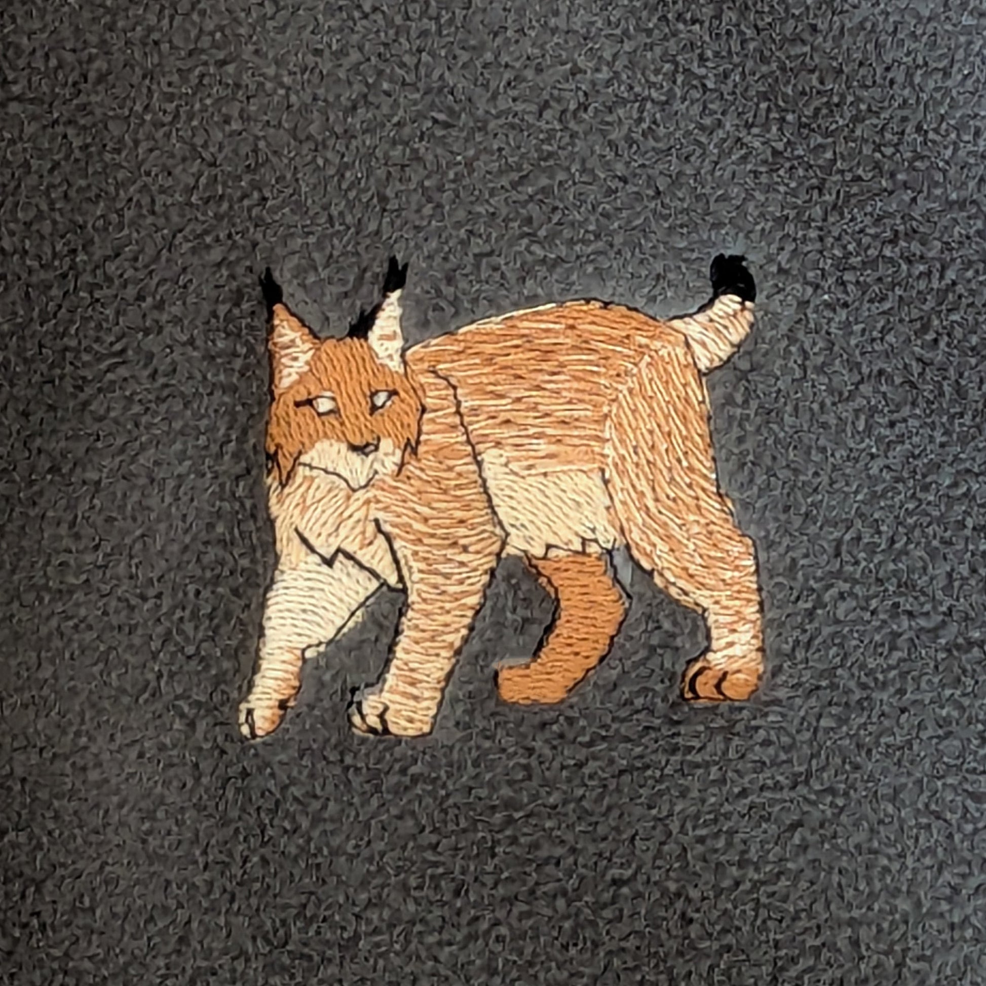 Closeup photo of the Lynx embroidery design