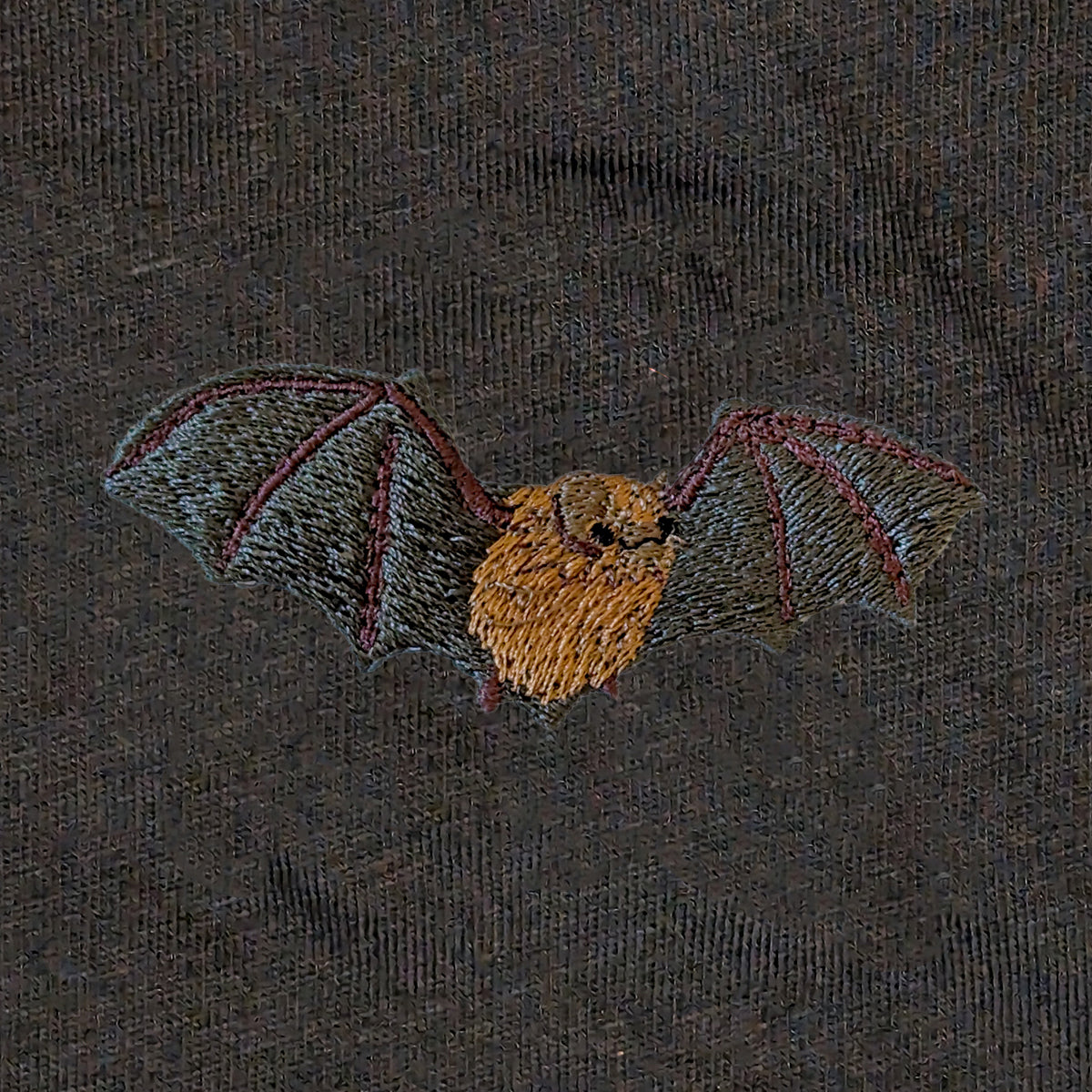 Closeup photo of the Noctule Bat embroidery design