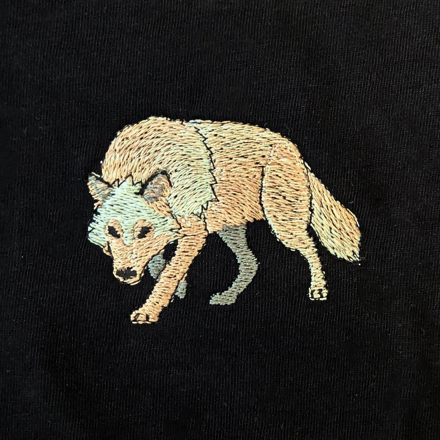 Closeup photo of the Grey Wolf embroidery design
