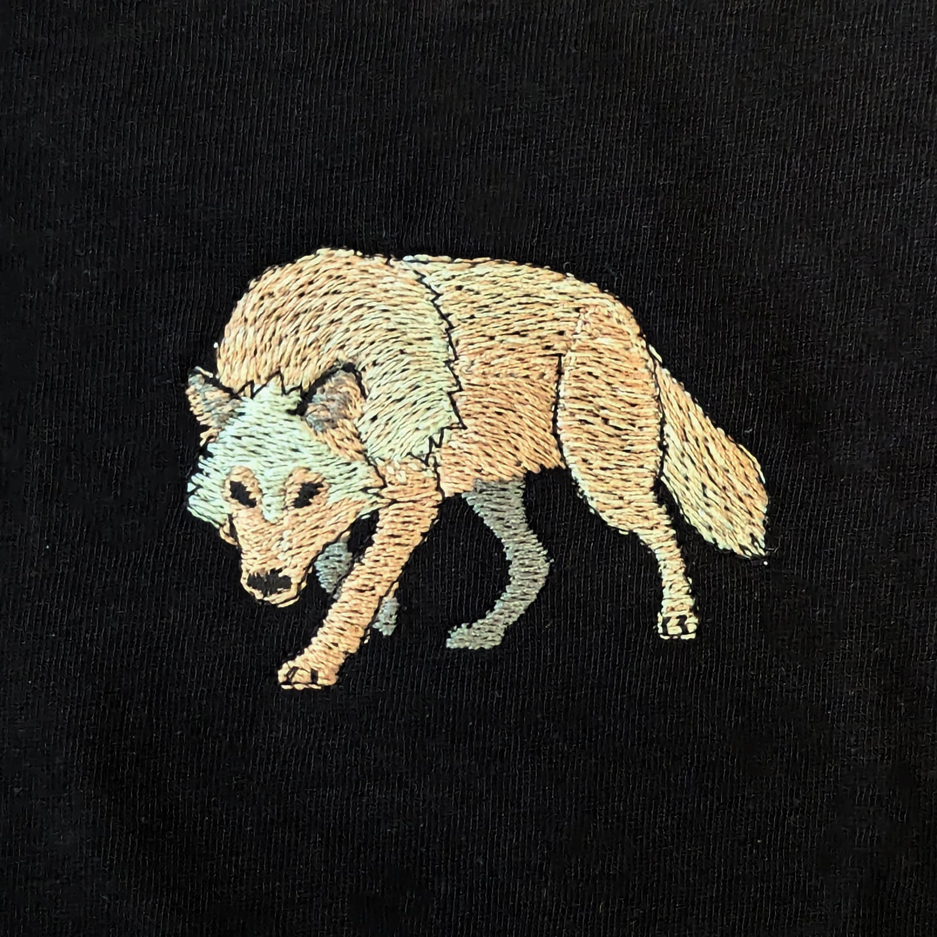 Closeup photo of the Grey Wolf embroidery design